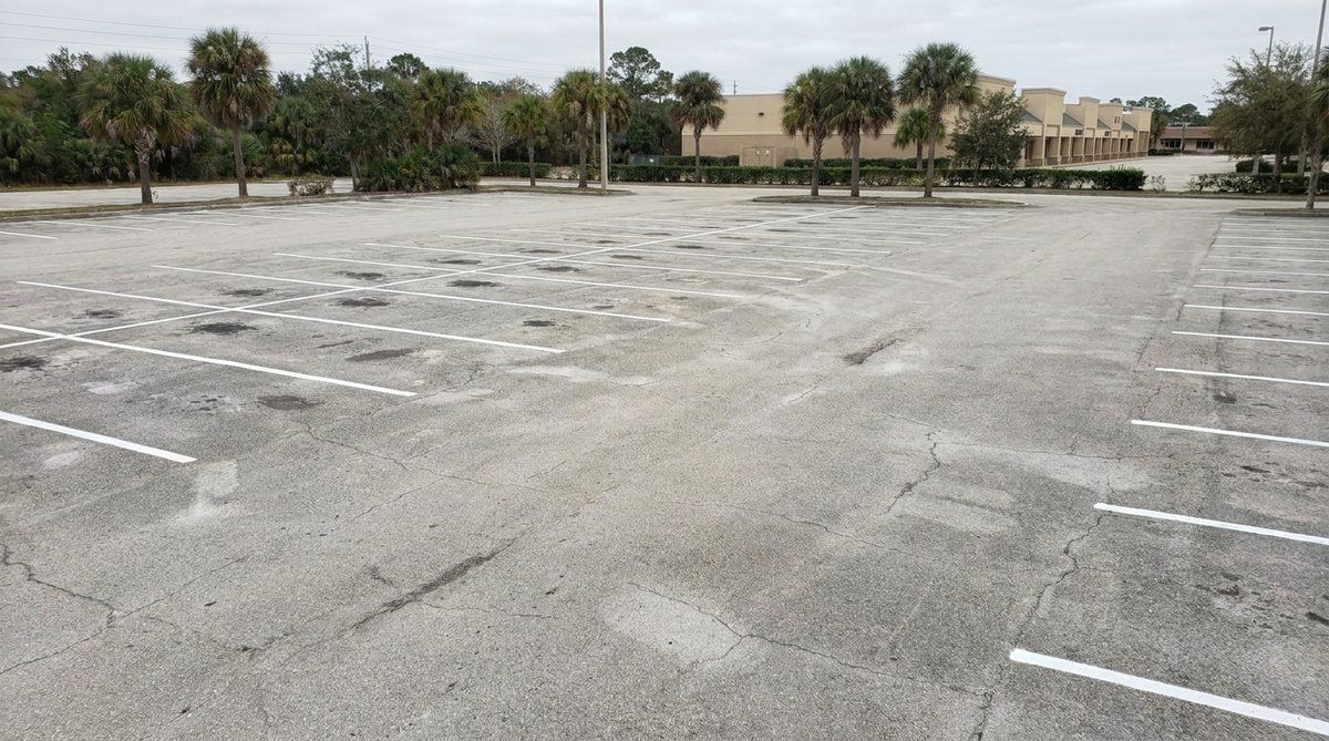Same parking lot with fresh striping